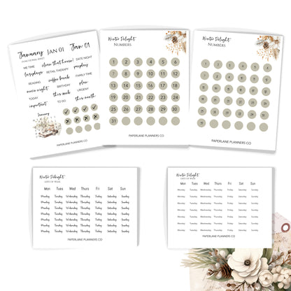 Set of planner stickers with dates and floral designs. Paperlane Planners Co